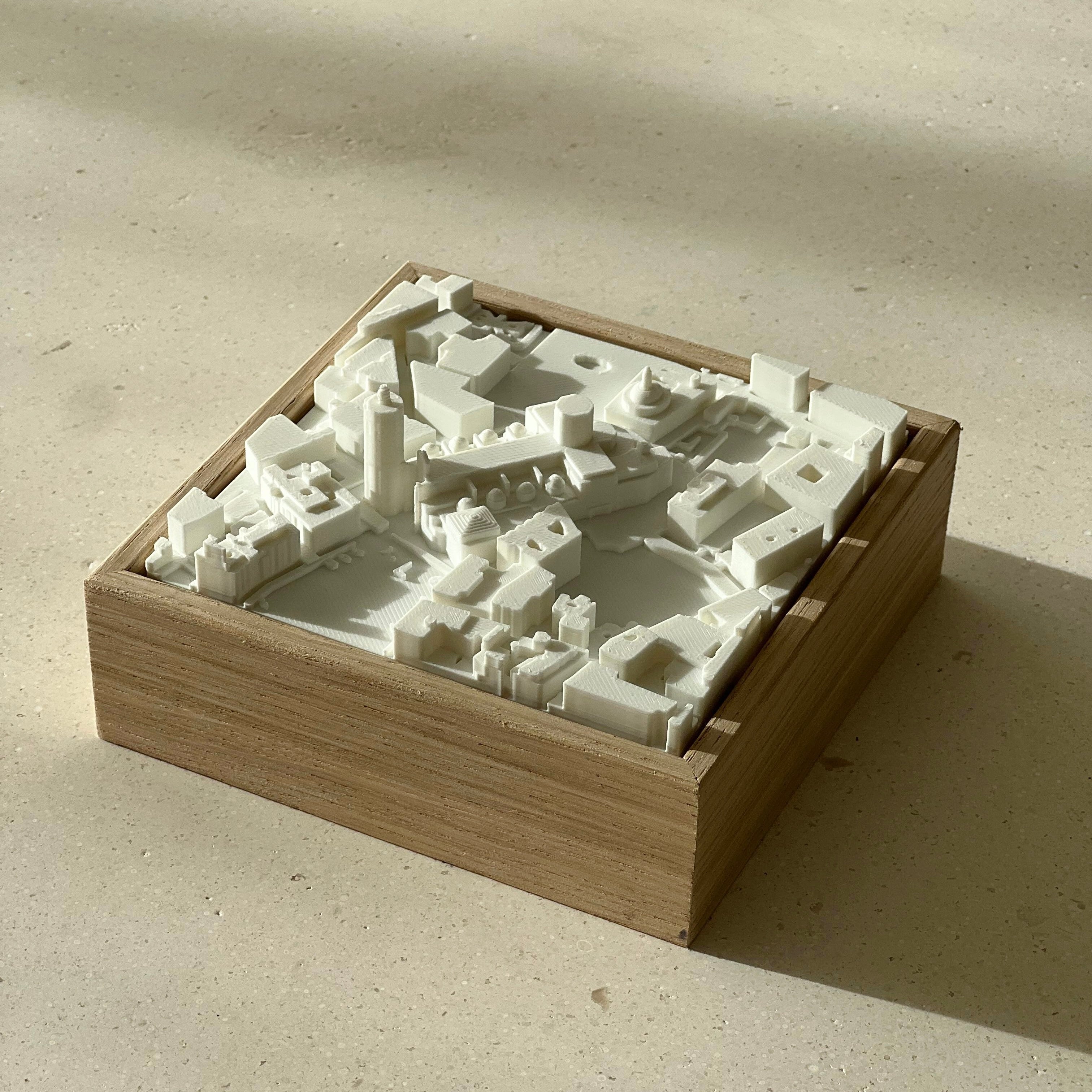 3D city map decor in a wooden frame, minimalist urban model for travelers and home decoration