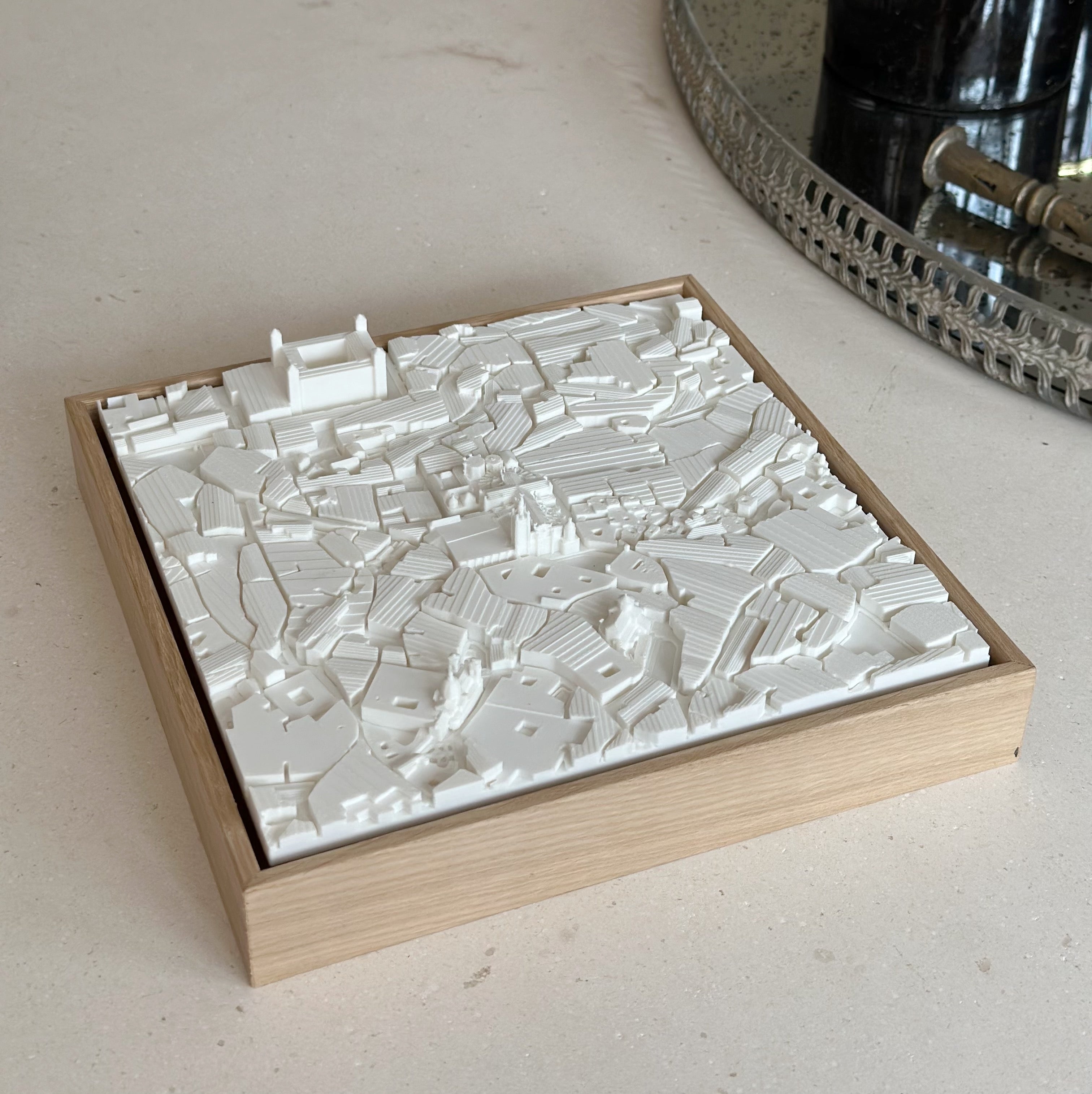 3D city map wall art in white, wooden frame, modern home decor on tabletop