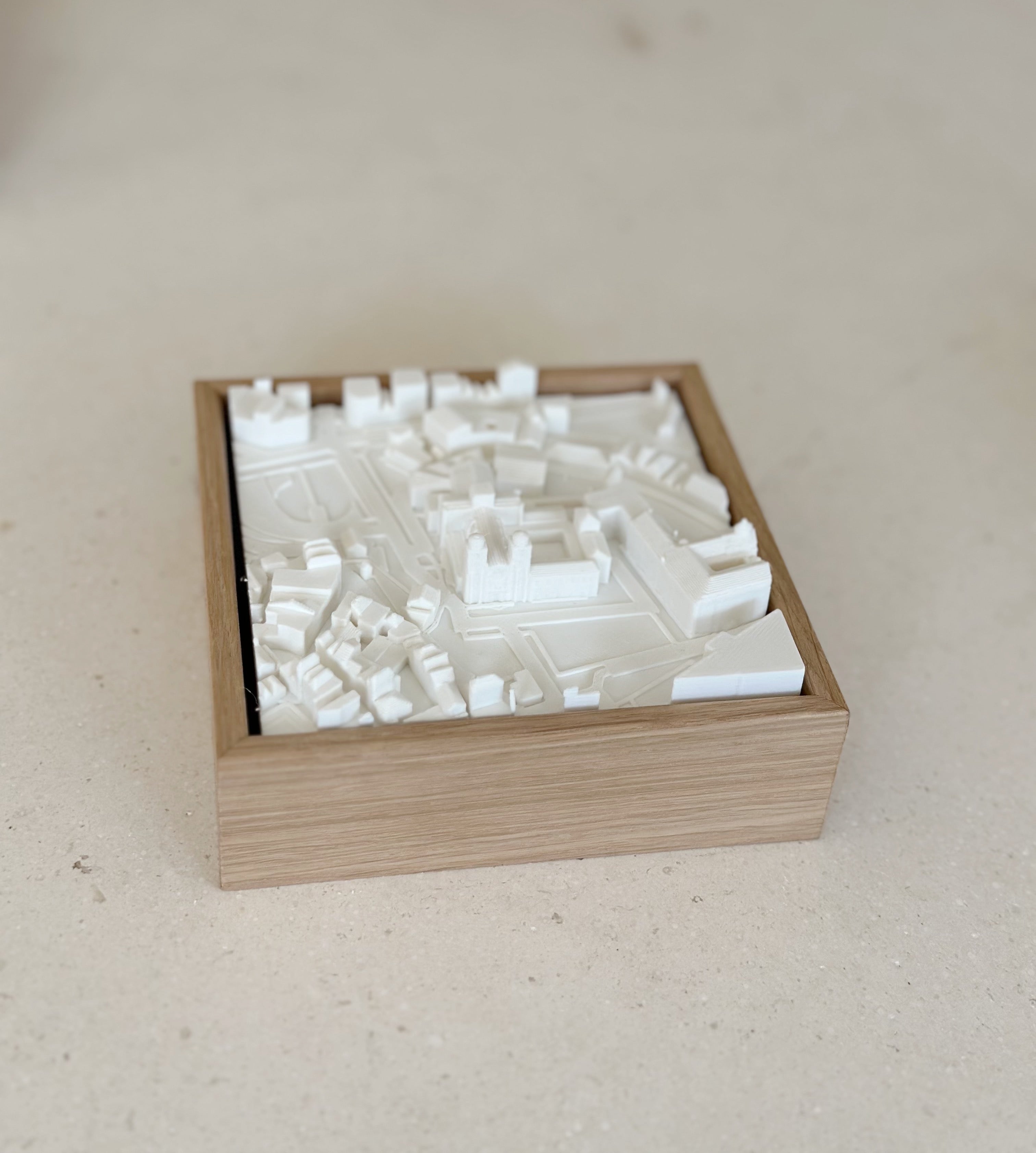 3D city map artwork in a wooden frame, minimalist urban decor model