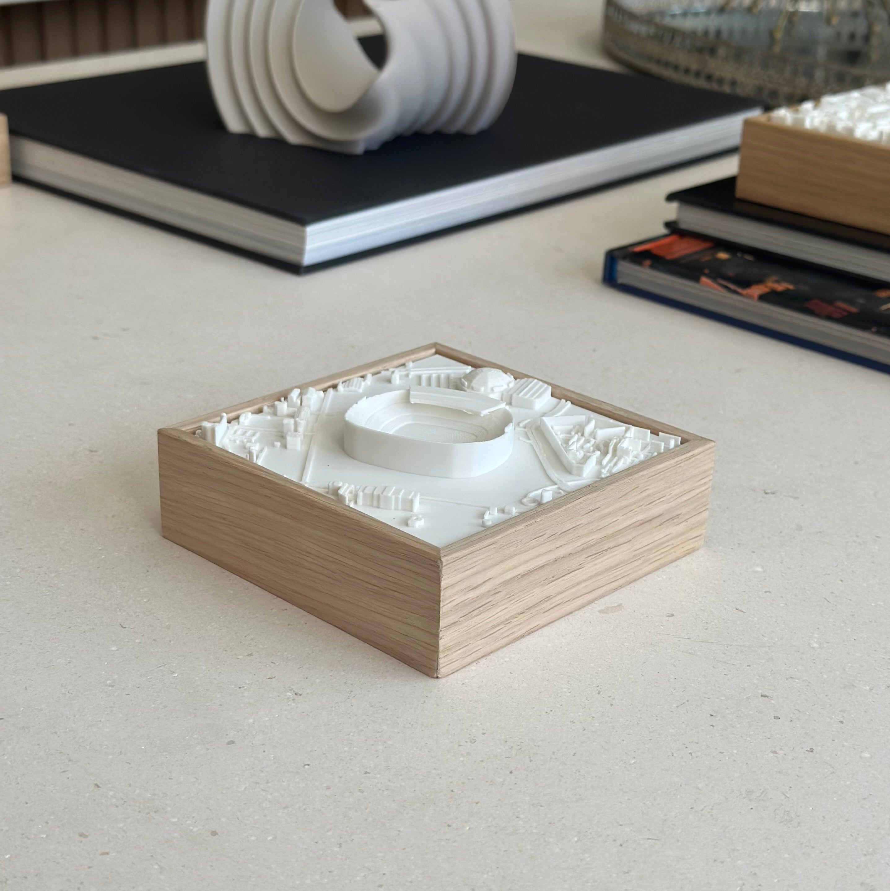 3D city map artwork in wooden frame on modern desk, decorative cityscape decor