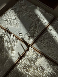 Set of white 3D city map wall art panels with intricate urban street and building details