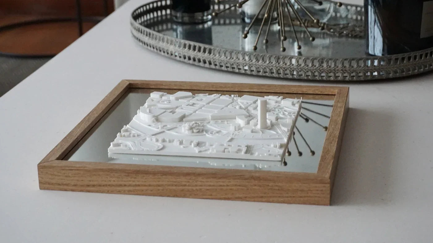 3D city map artwork in wood frame on a modern table, minimalist home decor