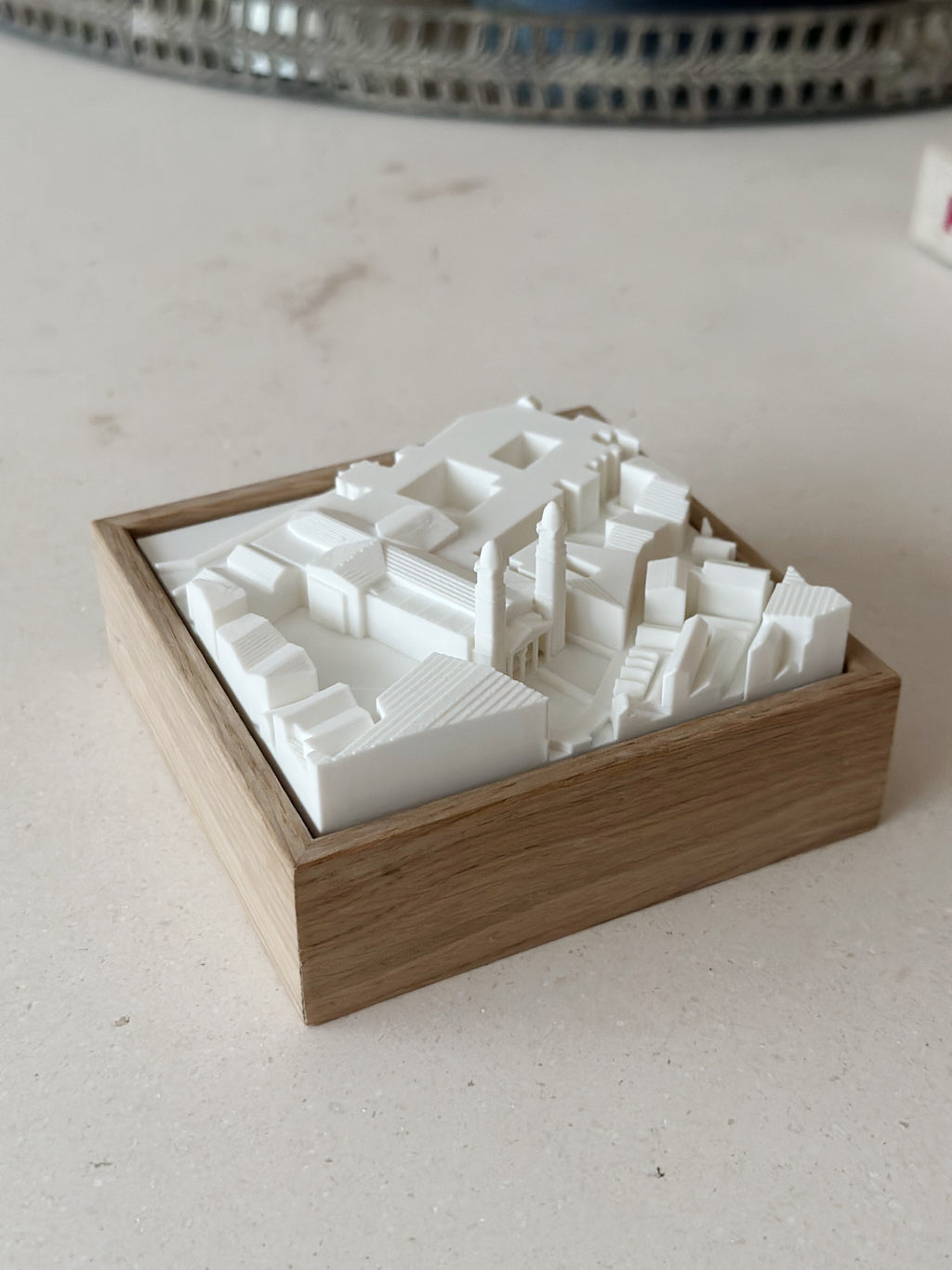 3D city map model in a wooden frame, minimalist urban decor piece