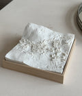 White 3D city map wall art in a wooden frame, modern cityscape decor piece