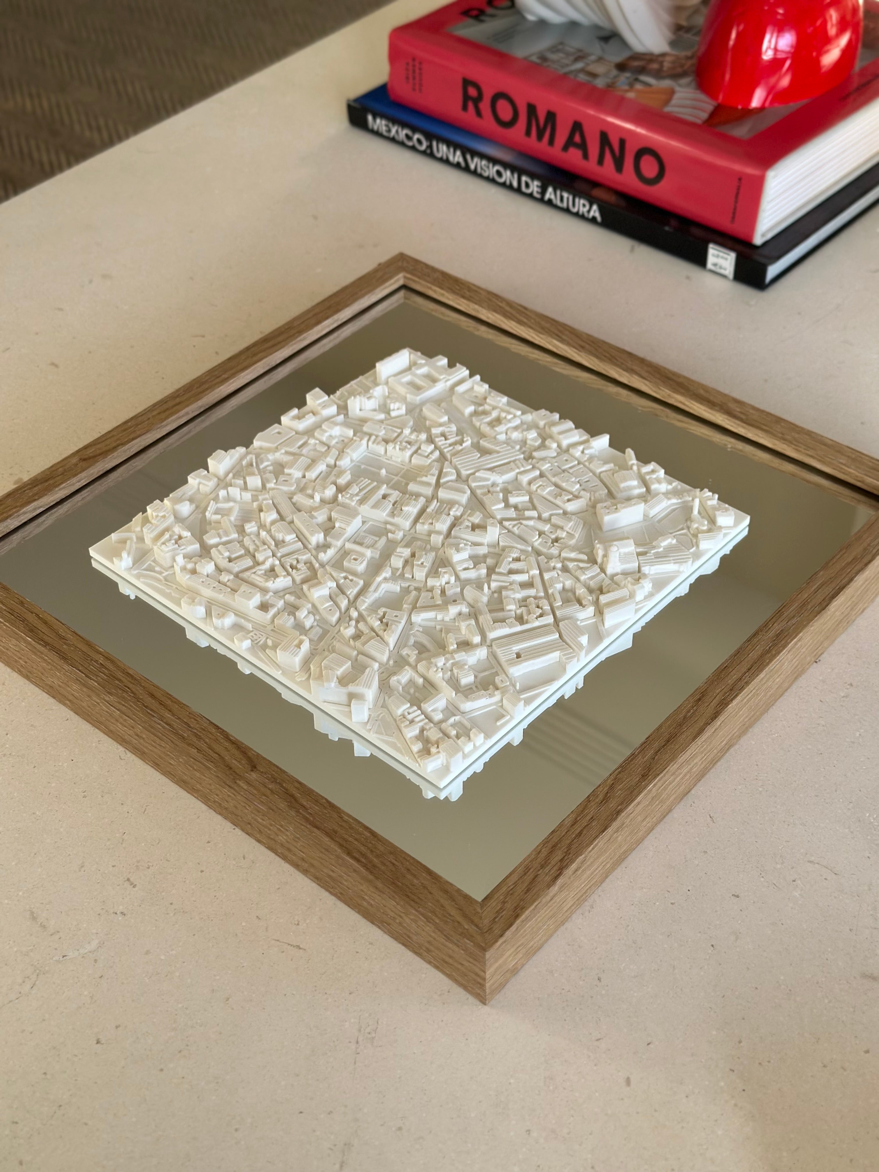 3D city map wall art in a wooden frame displayed on a modern table for home decor