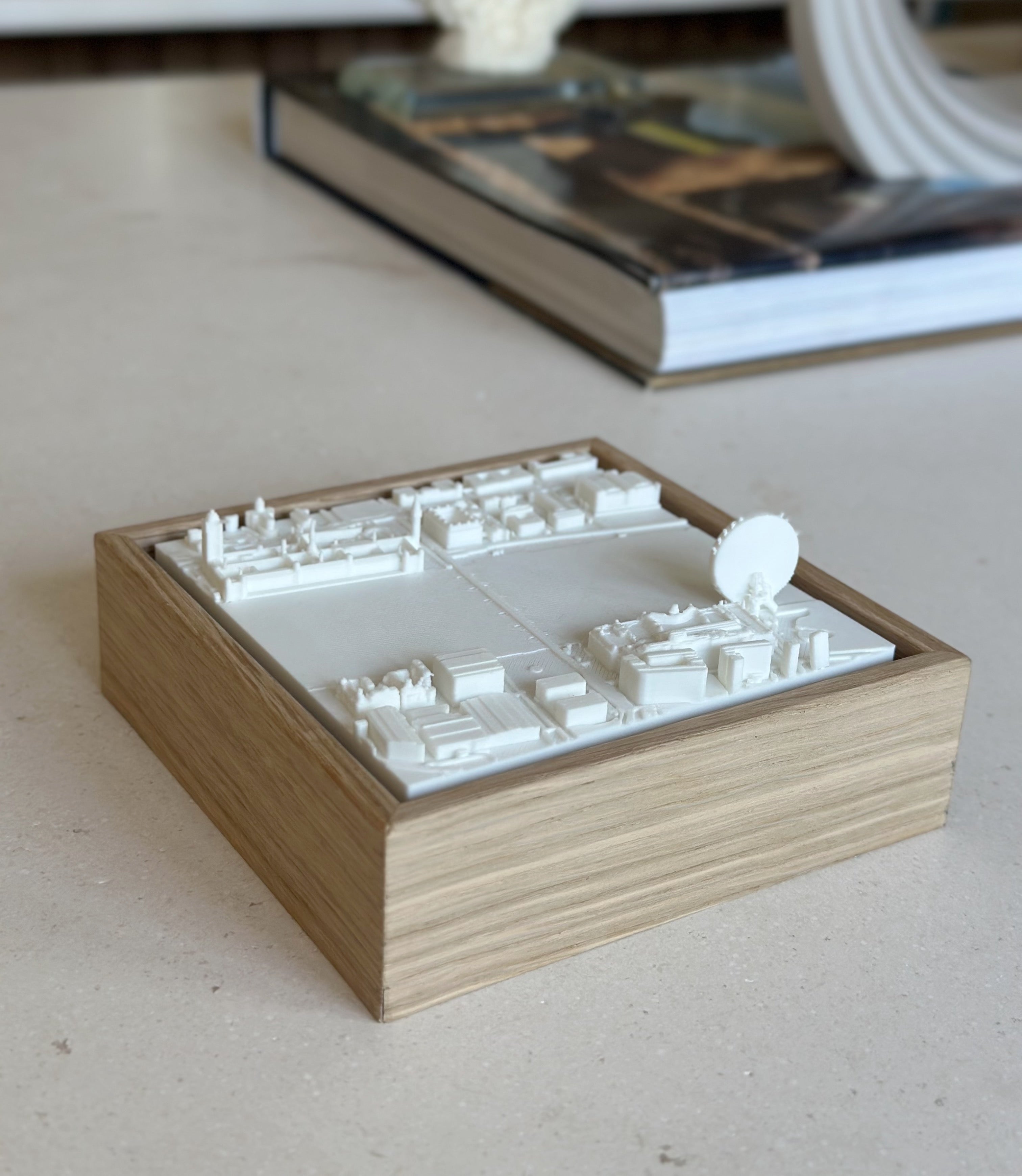 3D city map art in a wood frame on a table, modern home decor for travel lovers