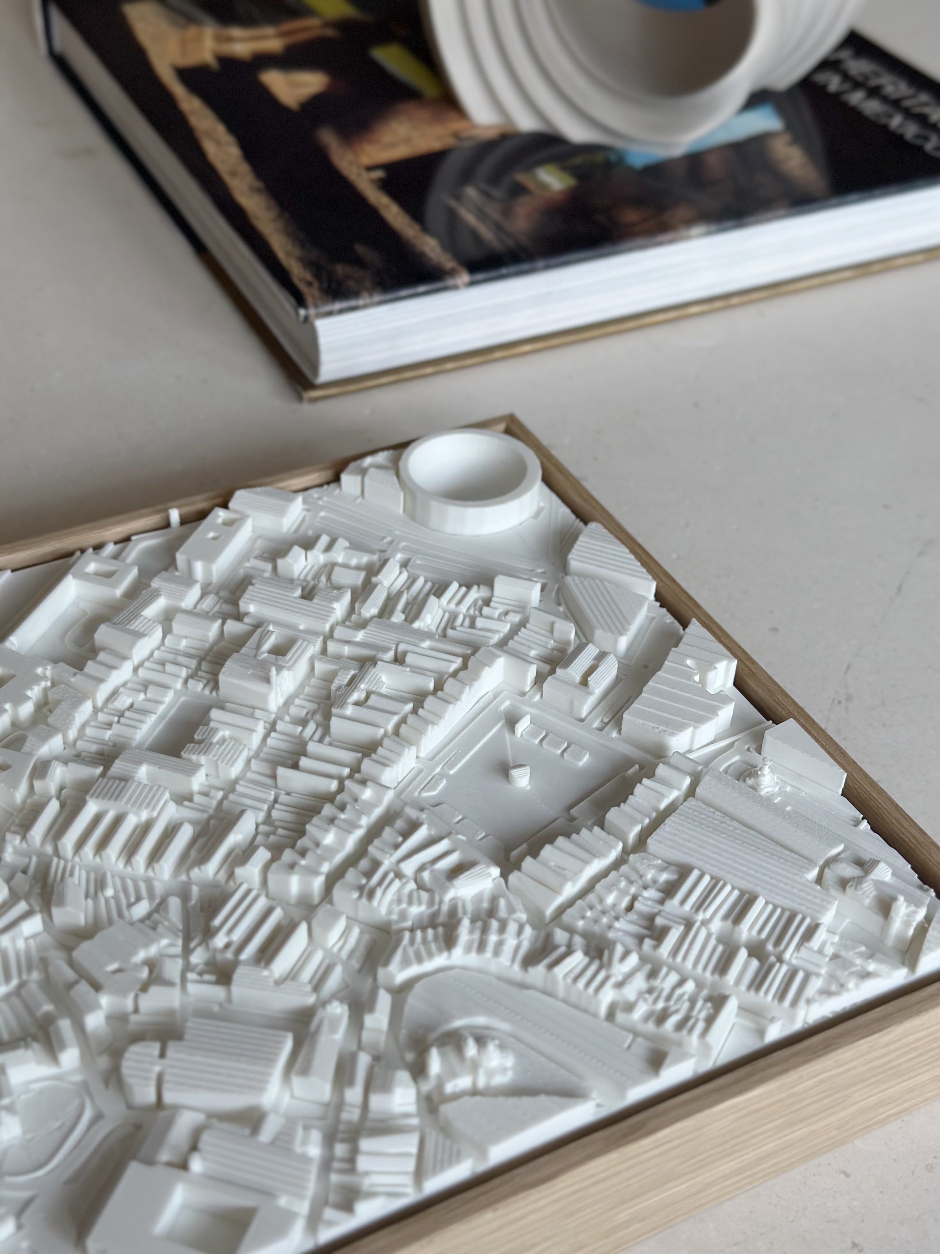 3D city map wall art in white frame, modern decor on minimalist table