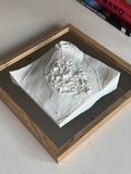 Framed 3D city map wall art with detailed topographic white miniature buildings