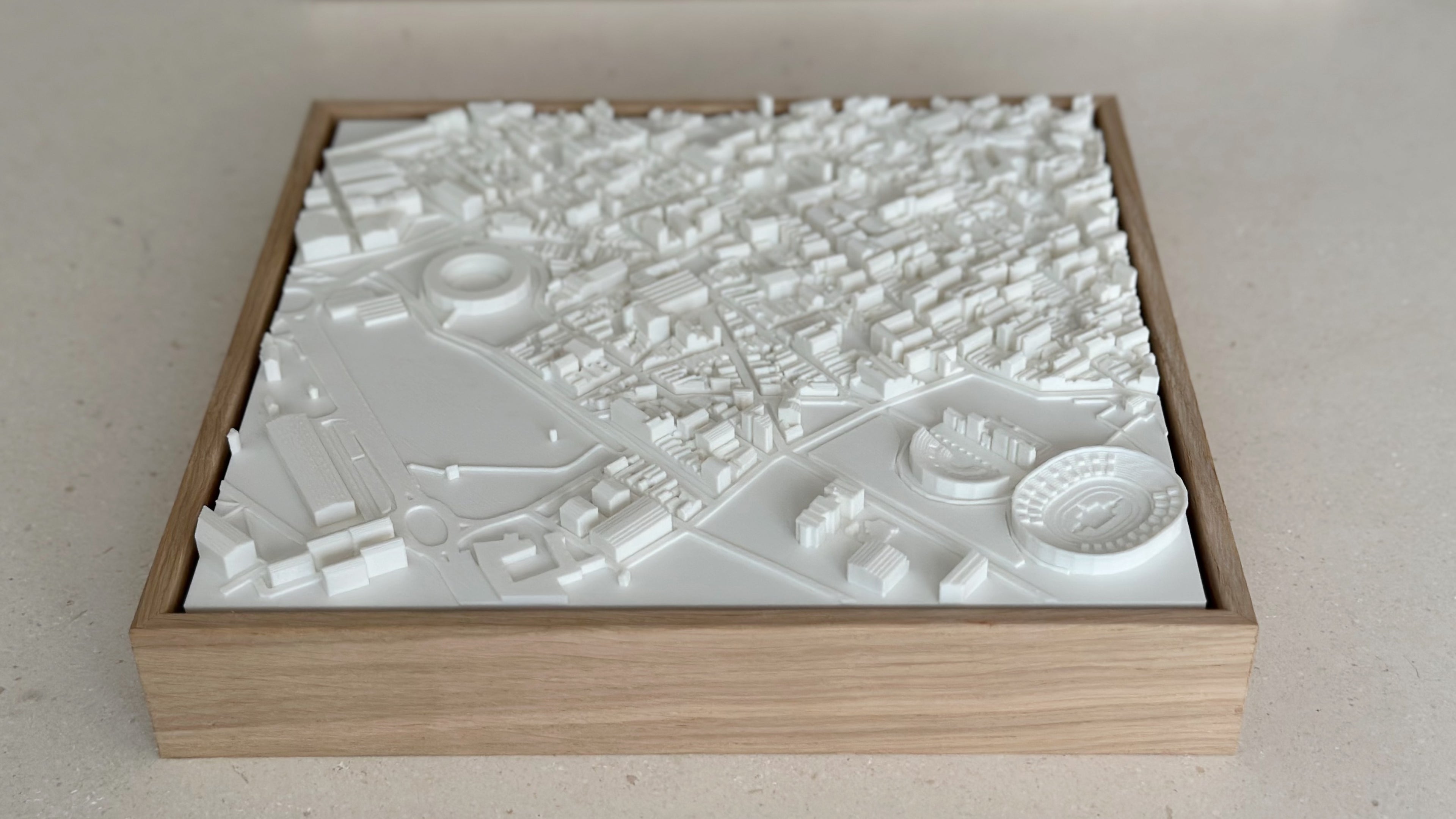 3D city map wall art in a wooden frame, detailed white model for home decor or gifts