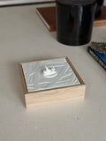 3D city map art in a wooden frame on a modern tabletop, minimalist home decor
