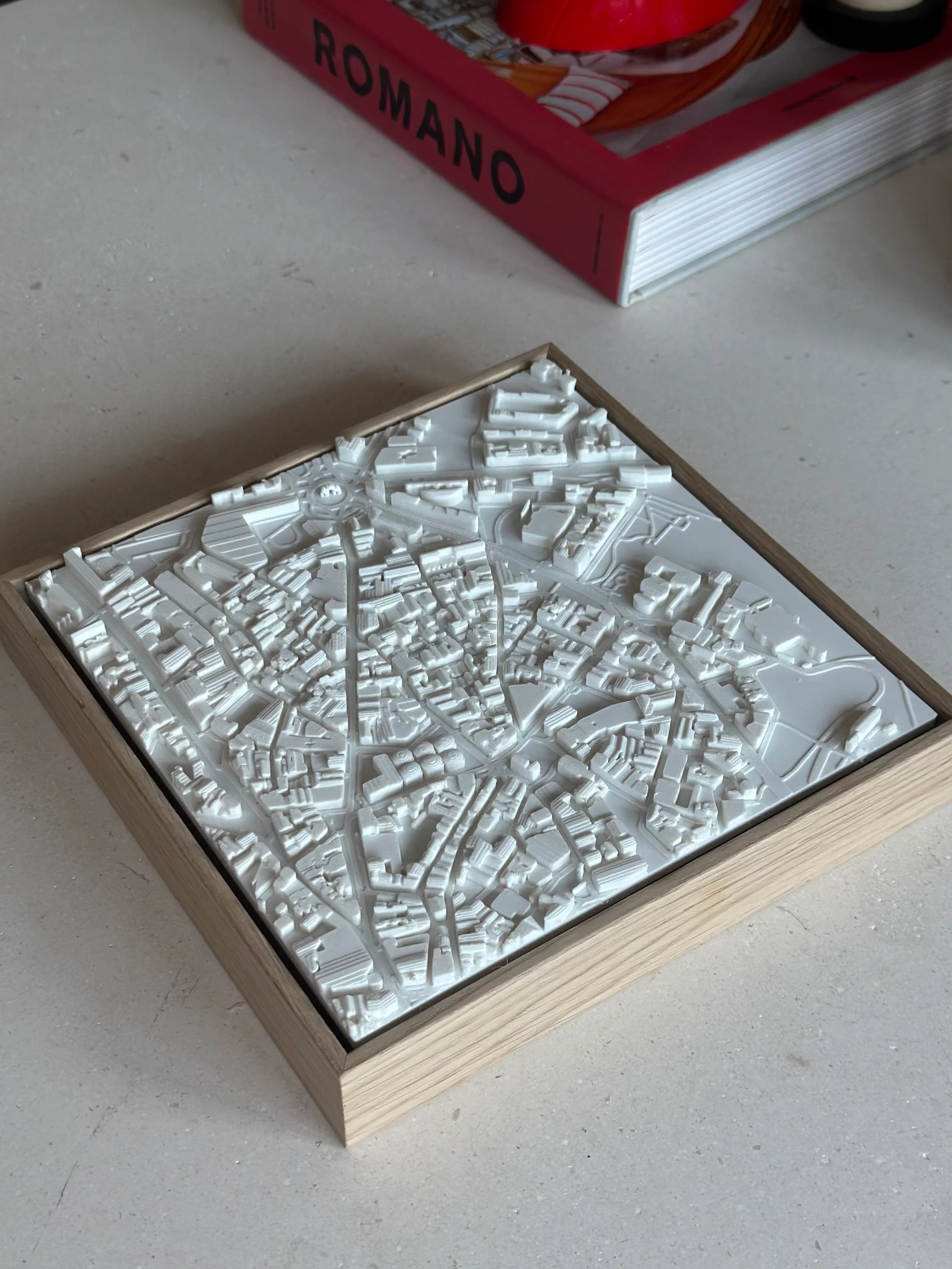 3D city map wall art in a wooden frame on a modern table, decorative city decor