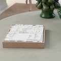 3D city map art in a wooden frame on a light table, modern home decor.