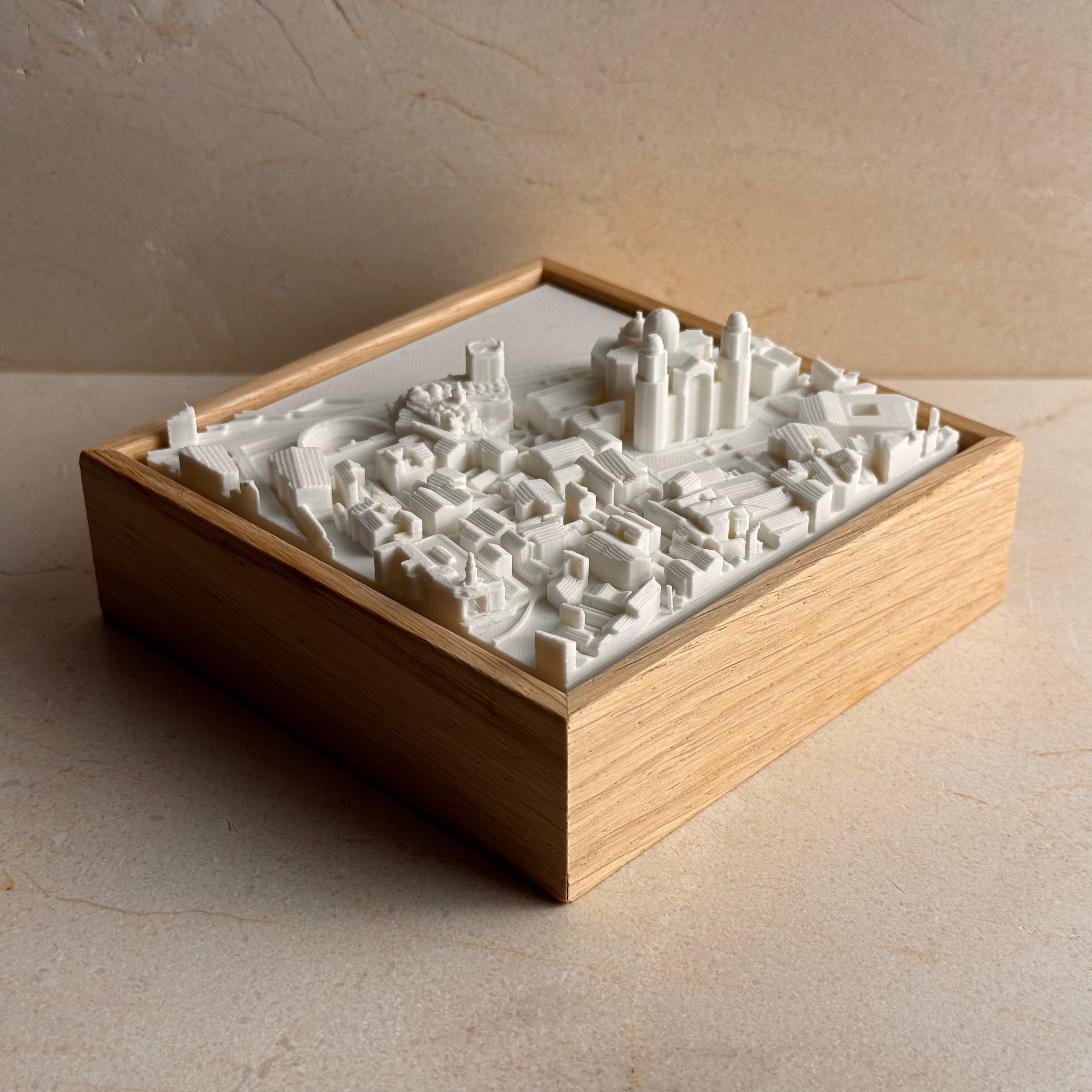 3D city map model in a wooden frame, detailed urban landscape decor piece