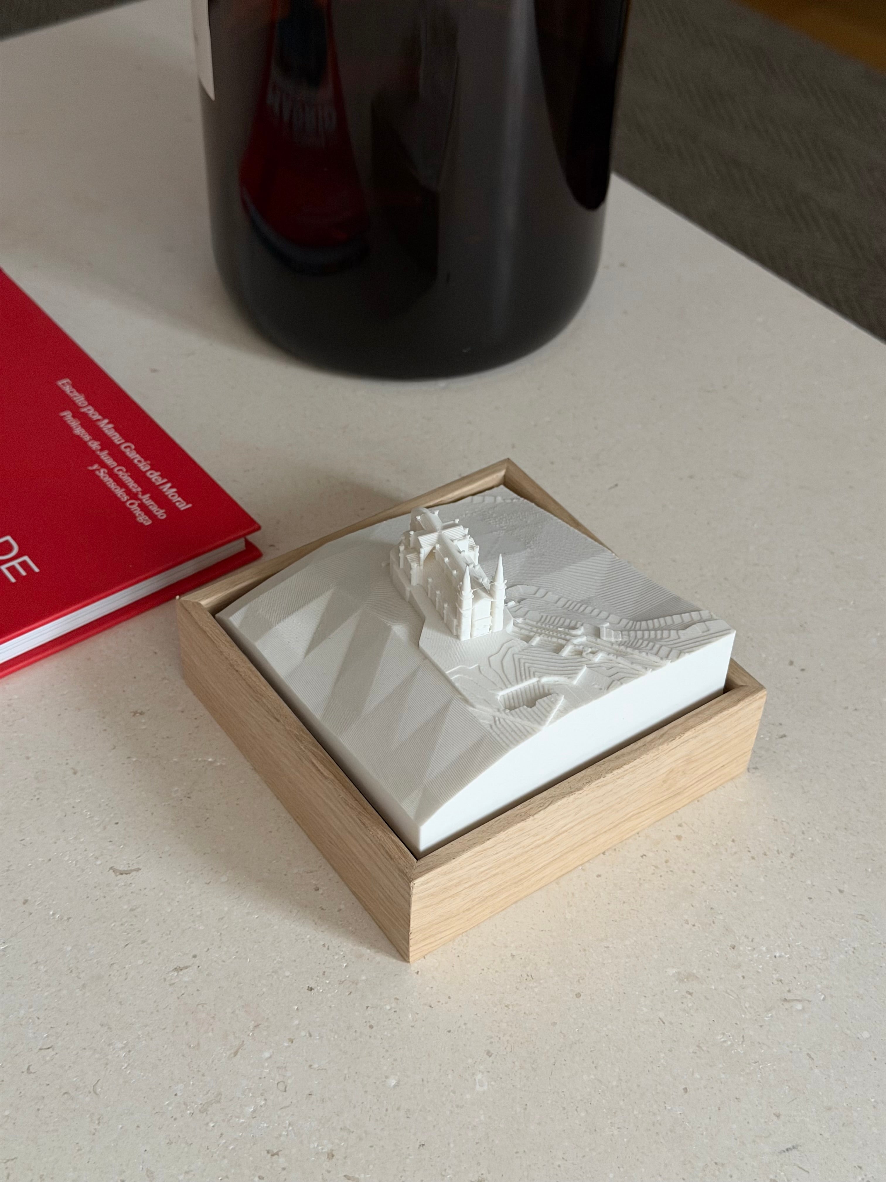 3D city map art in a wooden frame on a light table, modern home decor accessory