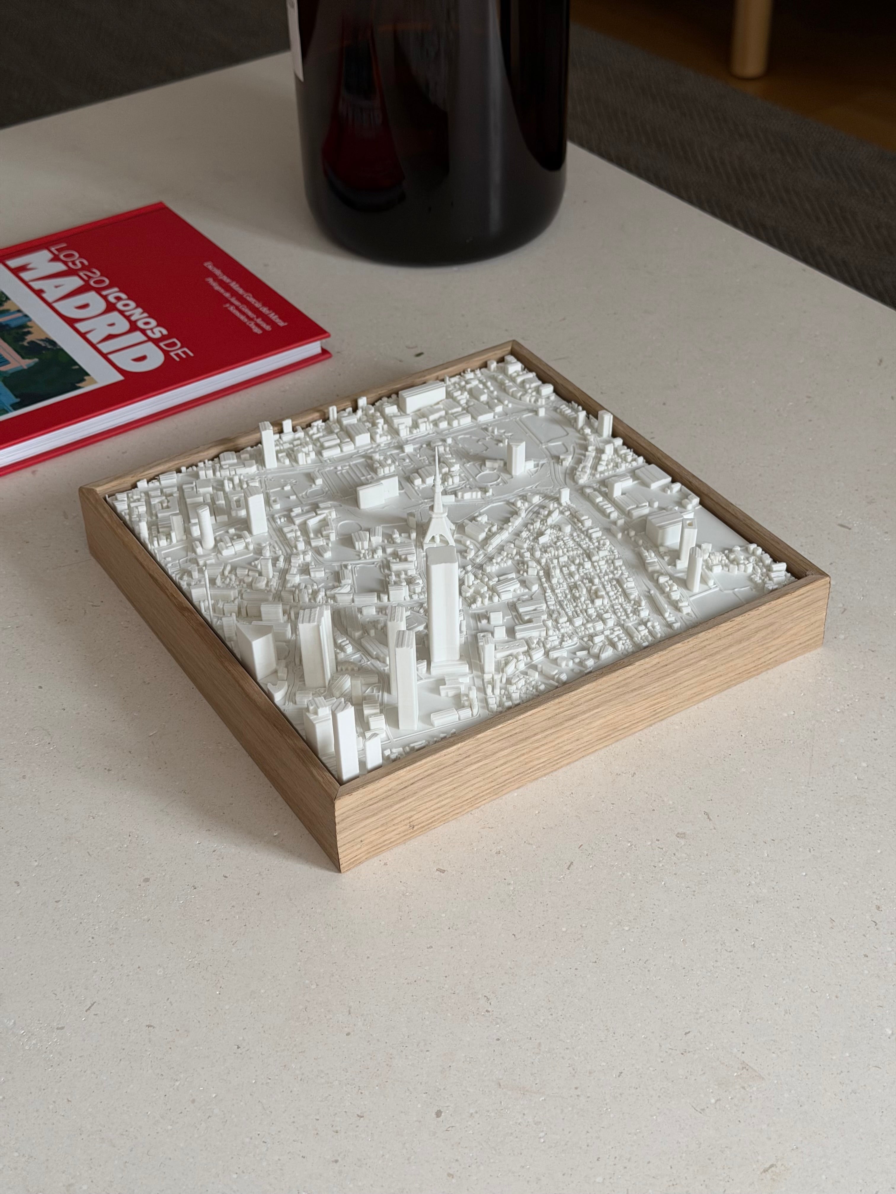 3D map of Madrid in a wooden frame on a coffee table, modern city wall art décor