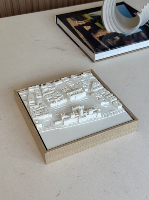 3D city map wall art with wooden frame on a modern table, home decor accent