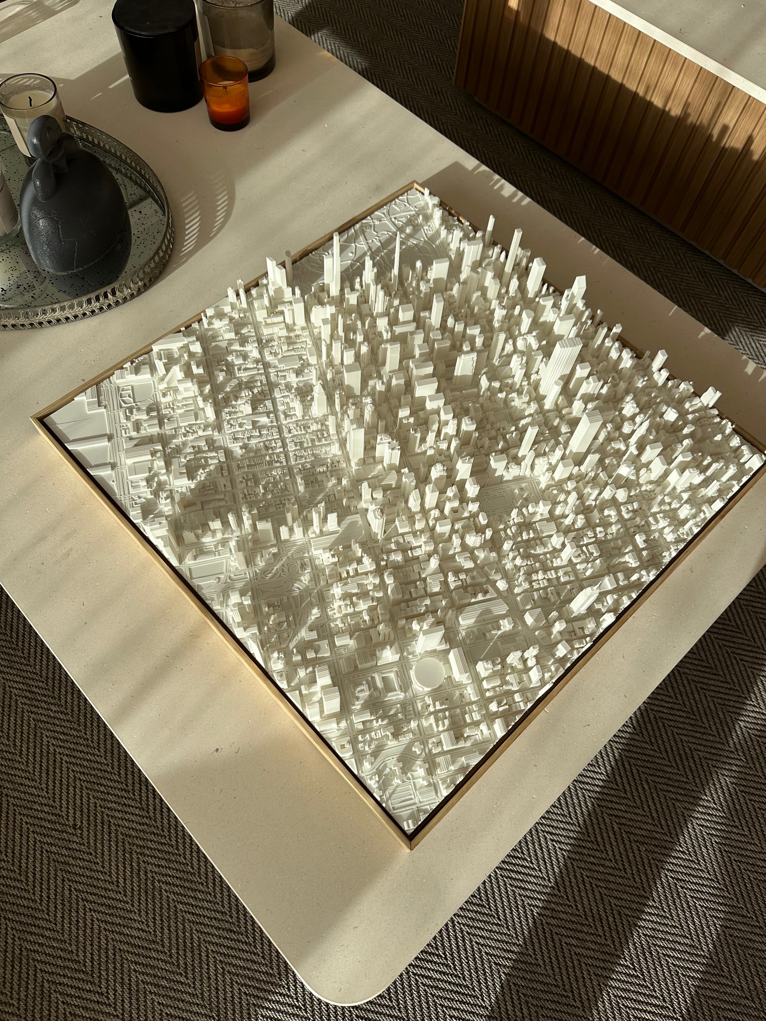 3D city map artwork of New York on a coffee table, modern decor in natural light