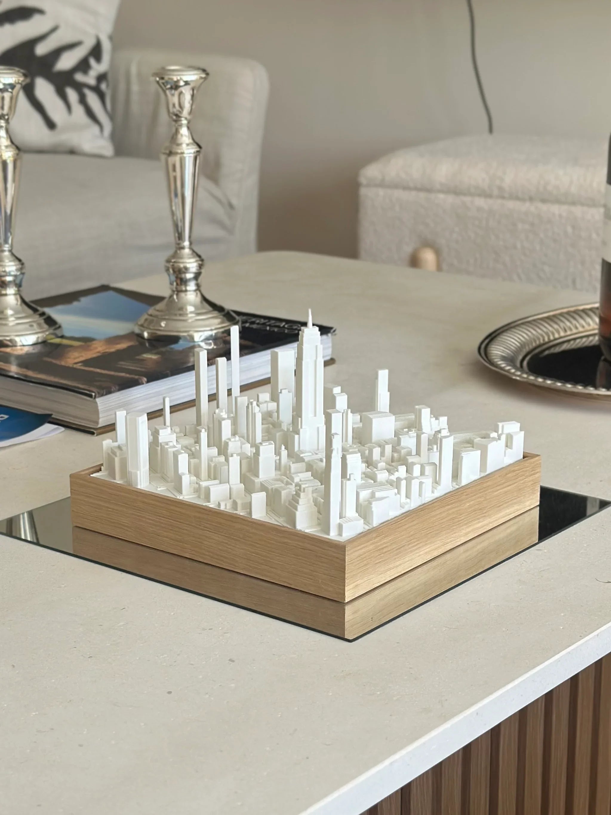 3D New York city map artwork with wooden frame on modern coffee table