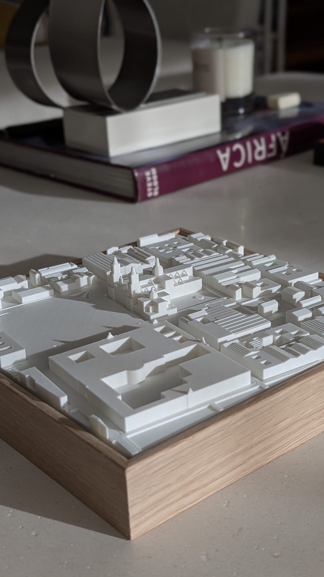 3D city map wall art with white buildings on wood frame, modern home decor