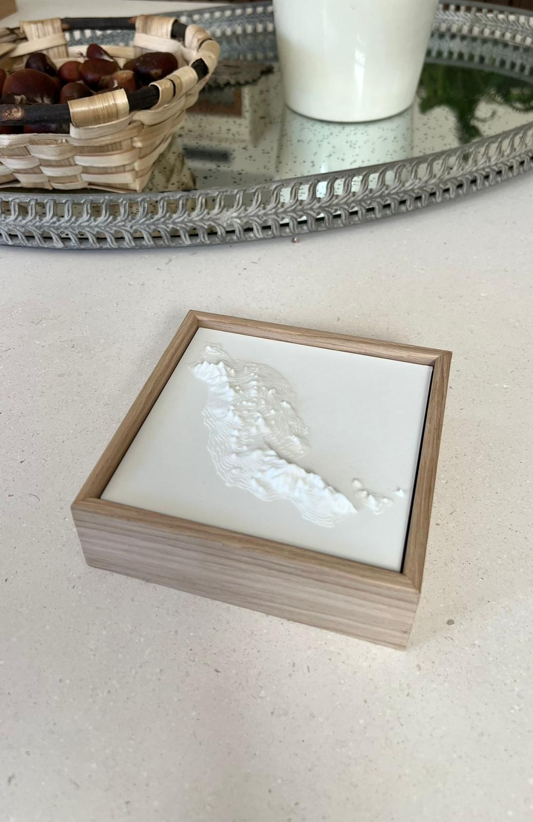 3D city map art in a wooden frame on a modern home table, decorative wall decor