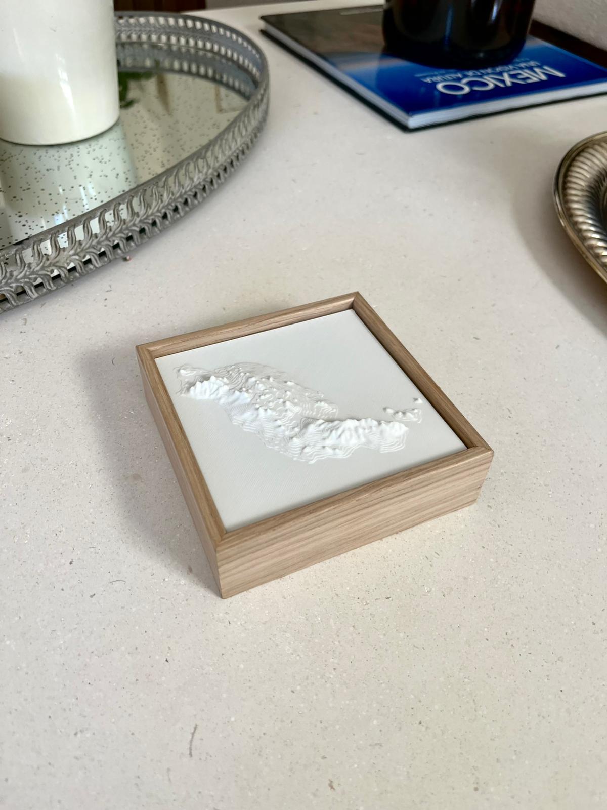 3D city map art in wooden frame on a table, unique home decor for travelers